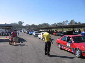 Other cars leaving the pits at Lakeside